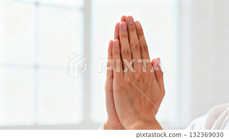Hands Performing Traditional Namaste Greeting Gesture Close-up 132369030