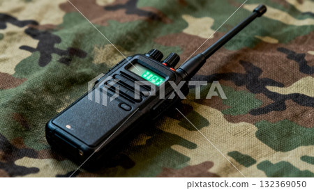 Tactical Radio Communication Device on Woodland Camouflage Tactical Radio Communication Device on Woodland Camouflage 132369050
