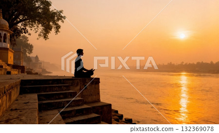 Yoga Meditation Pose at Sunrise by Ganges River 132369078