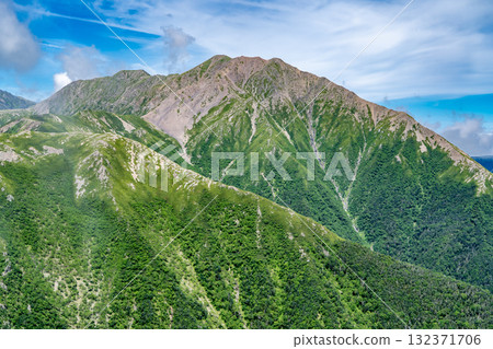 View of Mt. Akaishi and Mt. Ko-Akaishi from the summit of Mt. Nakamorimaruyama. Climbing Mt. Hijiri and Mt. Usagi in the Southern Alps View of Mt. Akaishi and Mt. Ko-Akaishi from the summit of Mt. Nakamorimaruyama. Climbing Mt. Hijiri and Mt. Usagi in the Southern Alps 132371706