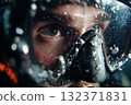 A close-up portrait of a diver in a mask 132371831
