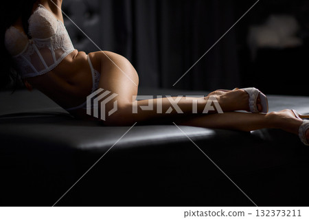 Experience the allure of seductive lingerie poses showcased in stunning vibrant colors 132373211