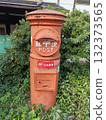 Old-fashioned red post box 132373565
