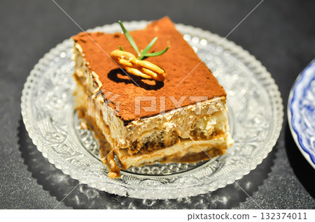 tiramisu or cake , cocoa cake or coffee cake or chocolate cake tiramisu or cake , cocoa cake or coffee cake or chocolate cake 132374011
