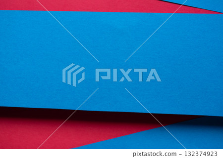 Overlapping blue and red construction paper Overlapping blue and red construction paper 132374923