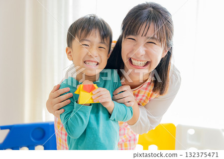 Nursery teachers and children 132375471