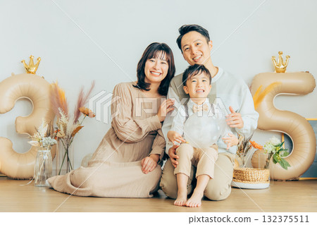 Family celebrating birthday Family celebrating birthday 132375511