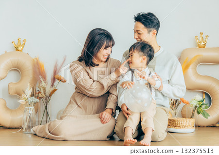 Family celebrating birthday 132375513