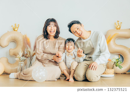 Family celebrating birthday Family celebrating birthday 132375521