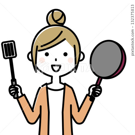 Young woman cooking with a frying pan 132375813