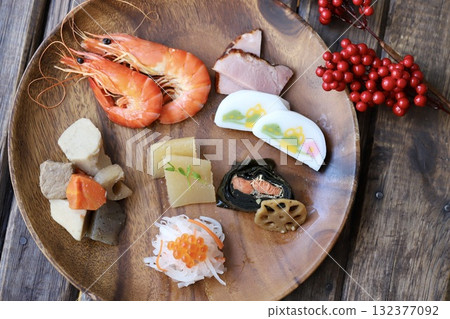 A single-serving New Year's dish served on an acacia plate 132377092