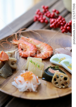 A single-serving New Year's dish served on an acacia plate A single-serving New Year's dish served on an acacia plate 132377098