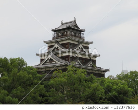 Hiroshima Castle tower surrounded by fresh greenery Hiroshima Castle tower surrounded by fresh greenery 132377636