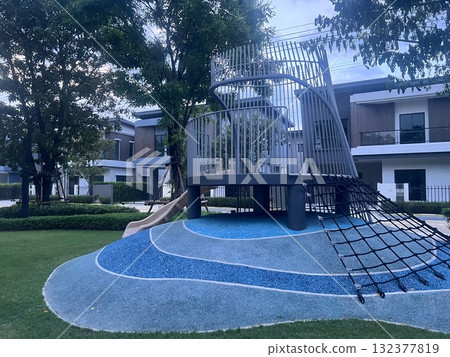 Playground with slides in residential area Playground with slides in residential area 132377819