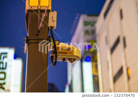 Tokyo cityscape in Japan. Security cameras on street corners in operation. Security cameras at the Akihabara Station Electric Town Exit, even in the rain. 132378470