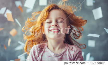 Joyful girl with flying hair and confetti. 132378808