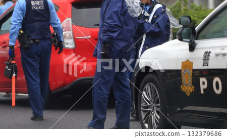 Patrol car and police officer 132379686