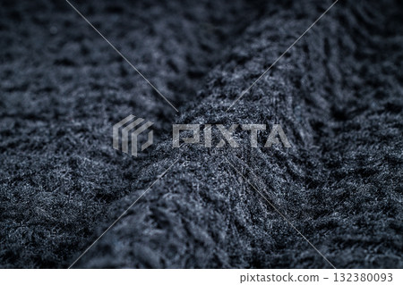 Texture of black fleece, shaggy high-tech synthetic knit Texture of black fleece, shaggy high-tech synthetic knit 132380093