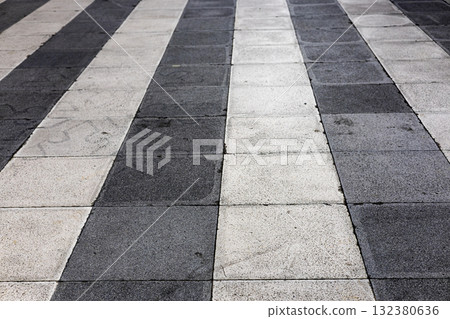 Repeating Pattern On Walkway Floor, Repeating pattern on a walkway floor highlights intricate designs, perfect for advertising stylish urban walkway materials. 132380636