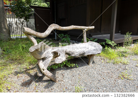 Wooden chairs placed outdoors Wooden chairs placed outdoors 132382666