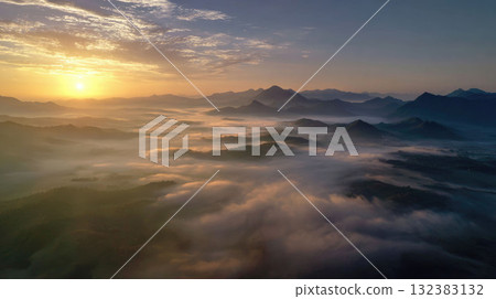 A stunning, ultra-realistic cinematic photo of a sunrise over misty mountains with golden light and serene clouds A stunning, ultra-realistic cinematic photo of a sunrise over misty mountains with golden light and serene clouds 132383132