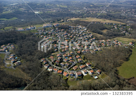 View of a residential area in Pays Basque, France on a clear day in spring View of a residential area in Pays Basque, France on a clear day in spring 132383395