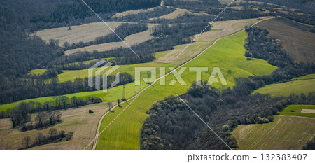 Scenic view of the Pays Basque landscape with lush green fields and hills Scenic view of the Pays Basque landscape with lush green fields and hills 132383407
