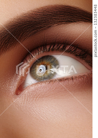 Macro closeup of human eye with detailed iris structure. Concept of vision, clarity, focus, and beauty of human perception. Perfect for medical, cosmetic and artistic visuals 132383448