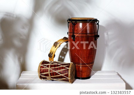 Composition of musical ethnic instrument. Maracas, tambourine, conga and ethnic drum. Percussion rhytm instruments Composition of musical ethnic instrument. Maracas, tambourine, conga and ethnic drum. Percussion rhytm instruments 132383557