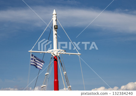 Boat mast with greek flag, Corfu (Korfu), Greece 132384240
