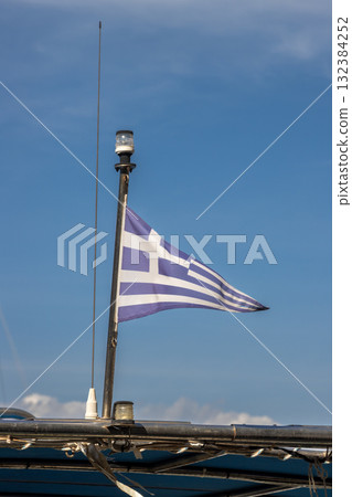Triangle greek flag and blue sky, Greece Triangle greek flag and blue sky, Greece 132384252