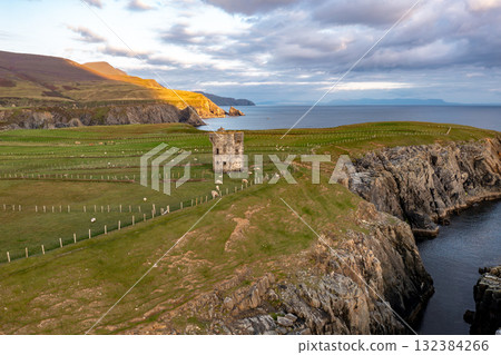 Aerial view of the coast at Malin Beg at the Napoleonic Signal Tower - County Donegal, Ireland Aerial view of the coast at Malin Beg at the Napoleonic Signal Tower - County Donegal, Ireland 132384266