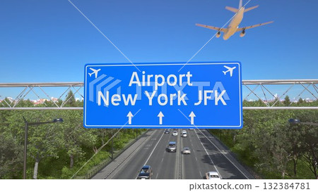Blue motorway sign for New York JFK Airport with an airliner flying above along the road toward the airport. 3D rendering 132384781