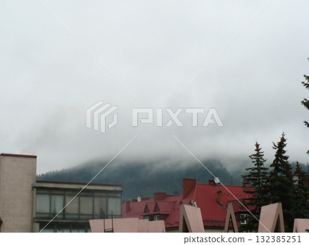 fog over the roofs of buildings in the city fog over the roofs of buildings in the city 132385251
