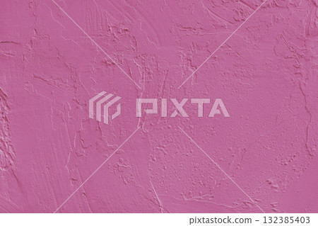 Close up pink colored painted plaster wall surface background with rough brushstrokes texture Close up pink colored painted plaster wall surface background with rough brushstrokes texture 132385403