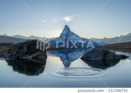 Matterhorn Mountain and Reflection in Lake Stellisee. Switzerland Matterhorn Mountain and Reflection in Lake Stellisee. Switzerland 132386791