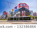 Sapporo streetcar passing through Susukino 132386866