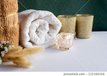 Natural beauty concept with sunlight and delicate spa decor. Horizontal shot. Warm tones Natural beauty concept with sunlight and delicate spa decor. Horizontal shot. Warm tones 132388168