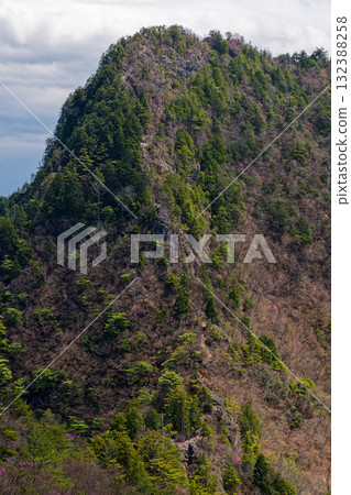 The Ryokami mountain ridgeline in early spring as seen from Hacchoone and Nishidake 132388258