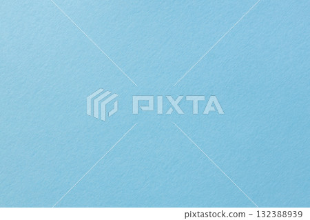 Light Blue Textured Paper Background with Subtle Grain Pattern Light Blue Textured Paper Background with Subtle Grain Pattern 132388939