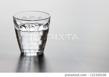Glass with water 132389106