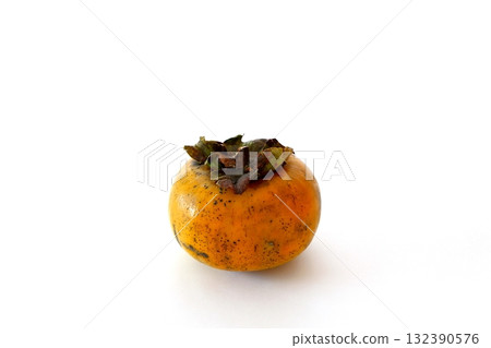 Imperfect persimmon on white background 132390576