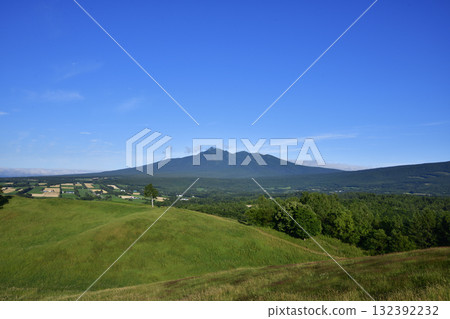 Starry Breeze Hill and Mount Shari in August Starry Breeze Hill and Mount Shari in August 132392232