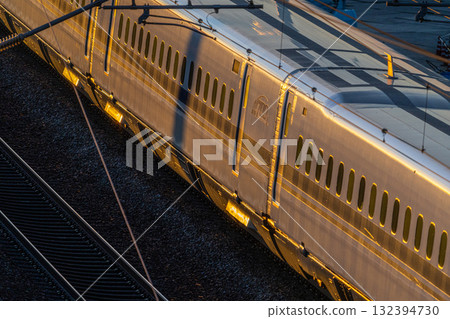 The body of a Nozomi Shinkansen train bound for Tokyo Station. A view from Shishikan Amusement Park on a winter evening. Higashi Ward, Okayama City, Okayama Prefecture. 132394730