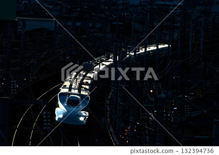 Nozomi Shinkansen bound for Tokyo Station. Winter sunset view from Shishikan Amusement Park. 10. Higashi Ward, Okayama City, Okayama Prefecture. Nozomi Shinkansen bound for Tokyo Station. Winter sunset view from Shishikan Amusement Park. 10. Higashi Ward, Okayama City, Okayama Prefecture. 132394736