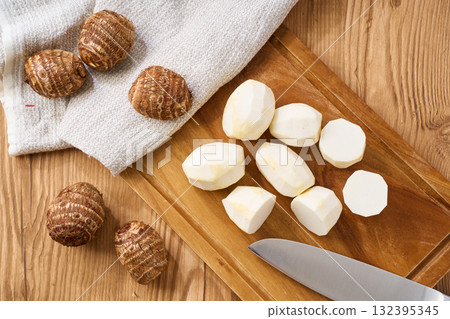 Taro prepared on a cutting board | Cutting cooking process 132395345