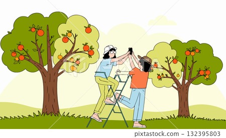 Friends Taking Photo of Orange Tree 132395803