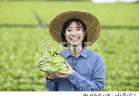 Women with harvested vegetables 132396370