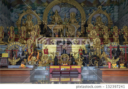 The statues are of various Hindu deities, including Lord Shiva inside a shrine from the Shiva Hindu Temple (Vihara). The statues are of various Hindu deities, including Lord Shiva inside a shrine from the Shiva Hindu Temple (Vihara). 132397241