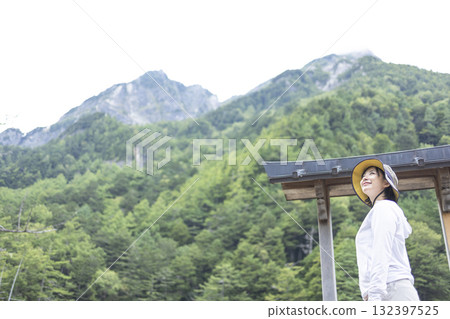 Woman sightseeing in nature Woman sightseeing in nature 132397525